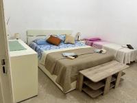 A bed or beds in a room at Marzamemi Da Giusy