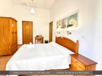 Postel nebo postele na pokoji v ubytování Hotel Kasa