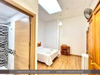 Postel nebo postele na pokoji v ubytování Hotel Kasa