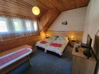 Posteľ alebo postele v izbe v ubytovaní Al Do Apartman