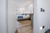 Ein Bett oder Betten in einem Zimmer der Unterkunft Albergo Cappello e Cadore