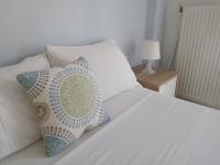 Posteľ alebo postele v izbe v ubytovaní Sea View Apartments 2
