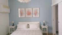 A bed or beds in a room at La Piazzetta