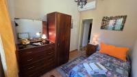 Posteľ alebo postele v izbe v ubytovaní a casa di Gabri