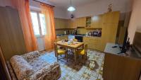 Kuchyňa alebo kuchynka v ubytovaní a casa di Gabri