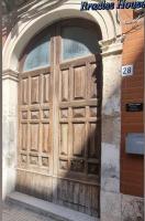 The facade or entrance of Eracles House near Ortigia Island