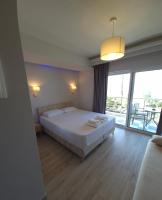 Posteľ alebo postele v izbe v ubytovaní Nikolaidis Apartments