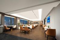 Una televisión o centro de entretenimiento en Atour Hotel Hangzhou Cainiao Headquarter Fengxin Road