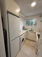 Kuchyň nebo kuchyňský kout v ubytování Acogedor apartamento junto a la playa by beBalmy
