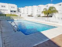 The swimming pool at or close to A Levante Conil- Solo familias y parejas