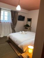 Postel nebo postele na pokoji v ubytování Shamrock Elati Retreats