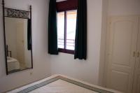 Posteľ alebo postele v izbe v ubytovaní Apartamentos Zafiro Unitursa