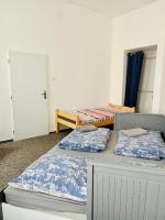 Postel nebo postele na pokoji v ubytování Apartmá Luxura