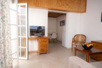A television and/or entertainment centre at Apartamento Marina Nacional
