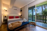 Postel nebo postele na pokoji v ubytování Crystal Flora Beach Resort - Ultimate All Inclusive