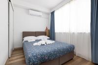 Ein Bett oder Betten in einem Zimmer der Unterkunft Villa Okruk-10 meters away from the beach
