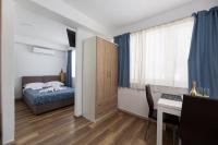 Ein Bett oder Betten in einem Zimmer der Unterkunft Villa Okruk-10 meters away from the beach