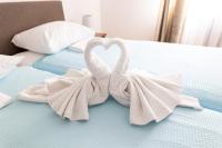 Ein Bett oder Betten in einem Zimmer der Unterkunft Villa Okruk-10 meters away from the beach