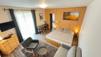 Postel nebo postele na pokoji v ubytování Apartmán u jezera Lipno - Nové