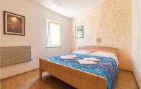 Posteľ alebo postele v izbe v ubytovaní 2 Bedroom Amazing Home In Pula