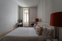 Postel nebo postele na pokoji v ubytování GuestReady - Charming House Marquês