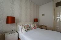 Postel nebo postele na pokoji v ubytování GuestReady - Charming House Marquês