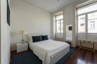 Postel nebo postele na pokoji v ubytování GuestReady - Charming House Marquês