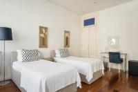 Postel nebo postele na pokoji v ubytování GuestReady - Charming House Marquês