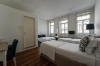 Postel nebo postele na pokoji v ubytování GuestReady - Charming House Marquês