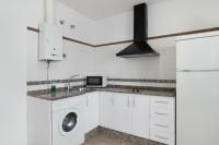Kuchyň nebo kuchyňský kout v ubytování Apartamento Perez Zara 3