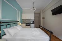 Posteľ alebo postele v izbe v ubytovaní Victoria Boutique Studios