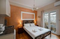 Posteľ alebo postele v izbe v ubytovaní Victoria Boutique Studios