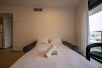 Ein Bett oder Betten in einem Zimmer der Unterkunft Valencia Apartment - By Harim
