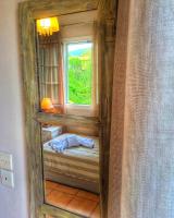A bed or beds in a room at Villa Del Sol