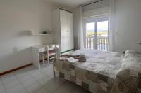 Posteľ alebo postele v izbe v ubytovaní Residenza Pierre & Vacances Luni Mare