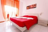 Posteľ alebo postele v izbe v ubytovaní Residenza Pierre & Vacances Luni Mare