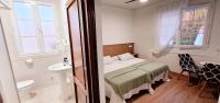 Posteľ alebo postele v izbe v ubytovaní Hostal Cachiño