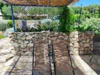Vonkajšia záhrada v ubytovaní Charming holiday apartment near beach