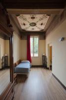 A bed or beds in a room at B&B Maggiore 58