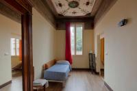 A bed or beds in a room at B&B Maggiore 58