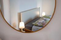 Łóżko lub łóżka w pokoju w obiekcie Apartment Stella Marina Sea view Free Parking