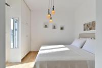 Posteľ alebo postele v izbe v ubytovaní DreamCatcher Sea view mini pool Paros