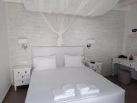 Posteľ alebo postele v izbe v ubytovaní Casa Bianca
