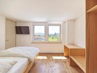 Hotel Rössli Tufertschwilにあるベッド