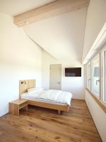 Hotel Rössli Tufertschwilにあるベッド