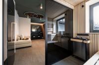 A bed or beds in a room at Hotel Belvedere - Fine Dining, Hideaway & SPA