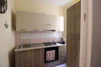 A kitchen or kitchenette at Eracles House near Ortigia Island