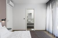 Posteľ alebo postele v izbe v ubytovaní Hotel - Teranea City Hvar