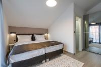Posteľ alebo postele v izbe v ubytovaní Hotel - Teranea City Hvar