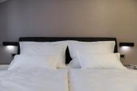 Posteľ alebo postele v izbe v ubytovaní Hotel - Teranea City Hvar